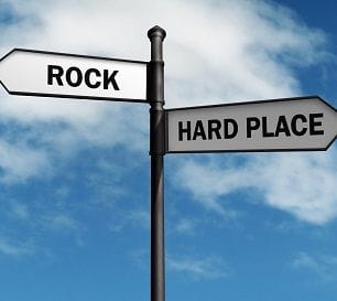 STUCK BETWEEN A ROCK AND A HARD PLACE STUCK BETWEEN A ROCK AND A HARD PLACE